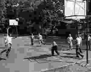 A pickup basketball game on the ever popular basketball court at Frothingham Park.