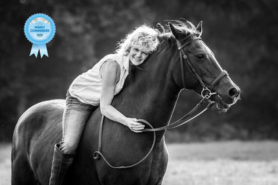 woman riding a horse