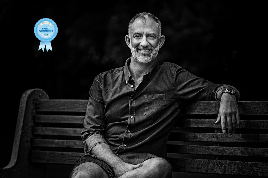 a man sitting on a bench