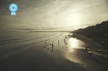 a group of people on a beach