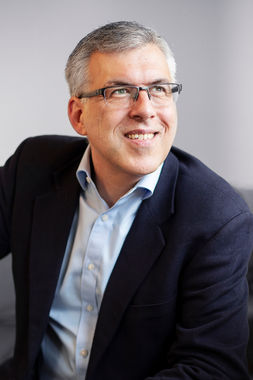 portrait of businessman in a suit and glasses