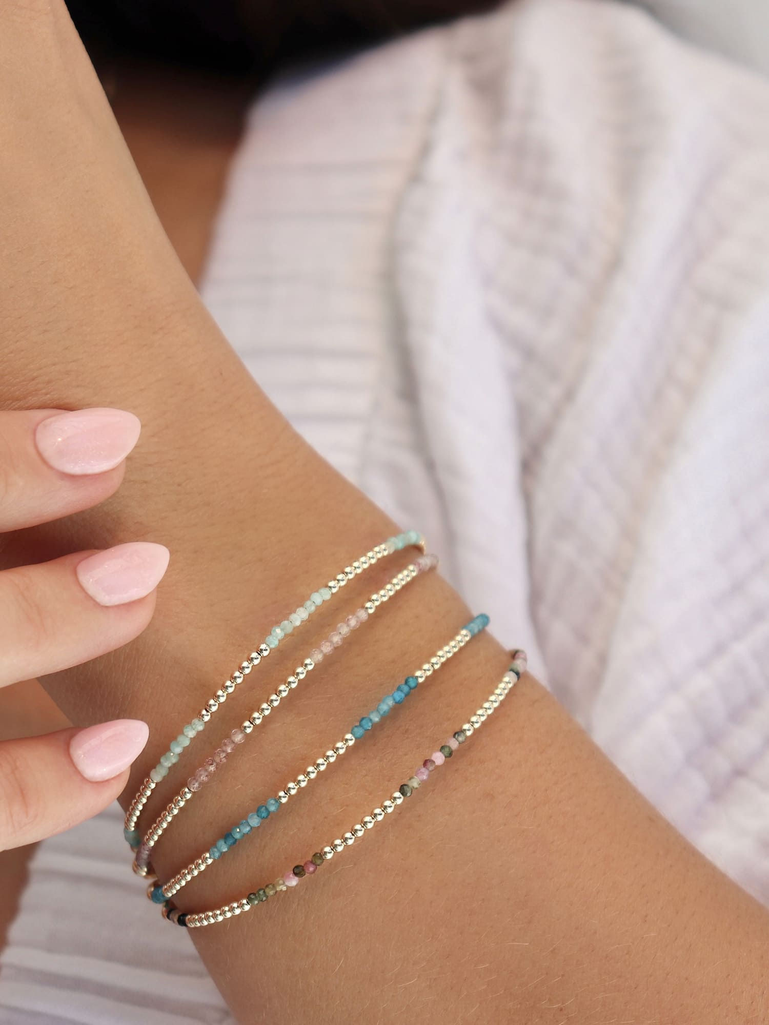 Delicate bracelet on a model, beaded bracelet