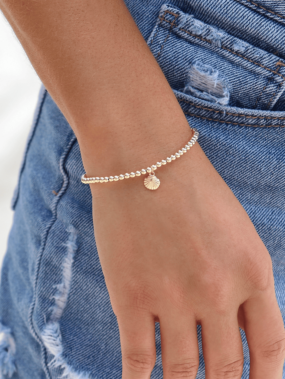 Thumbnail: Delicate Gold Filled Bracelet with Tiny Shell Charm
