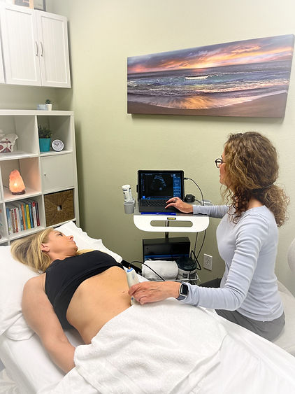 A womag gets ultrasound treatment at Core Functional Wellness