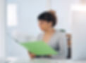 woman-reviews-paperwork-in-bright-office-setting-2026-03-25-06-48-34-utc.jpg