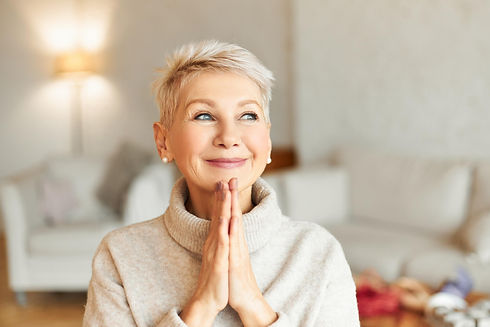 positive-mature-european-female-warm-sweater-having-dreamy-amazed-facial-expression-pressi