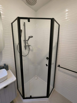 Black Optima frameless hinged shower screens Campbellfield, melbourne