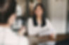 business-career-placement-concept-joyful-asian-woman-smiling-holding-resume-while-sitting-
