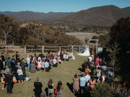 Wedding ceremony on The Lawn with expansive views of the Howqua Valley