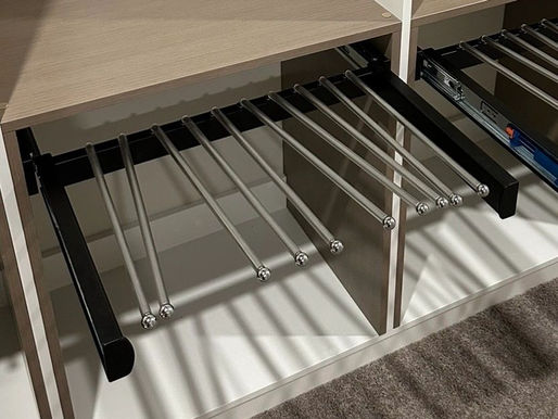 wardrobe detail of racks and hangers in custom wardrobes