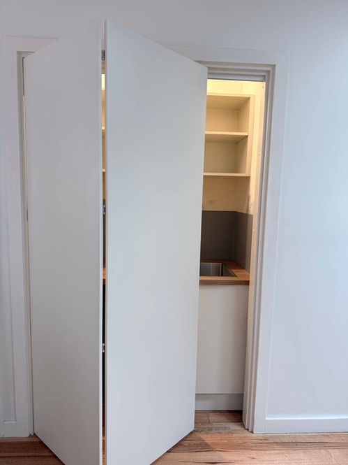 hidden laundry custom cabinets Melbourne