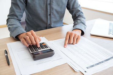 button-bookkeeper-calculating-white-calculator (1).jpg