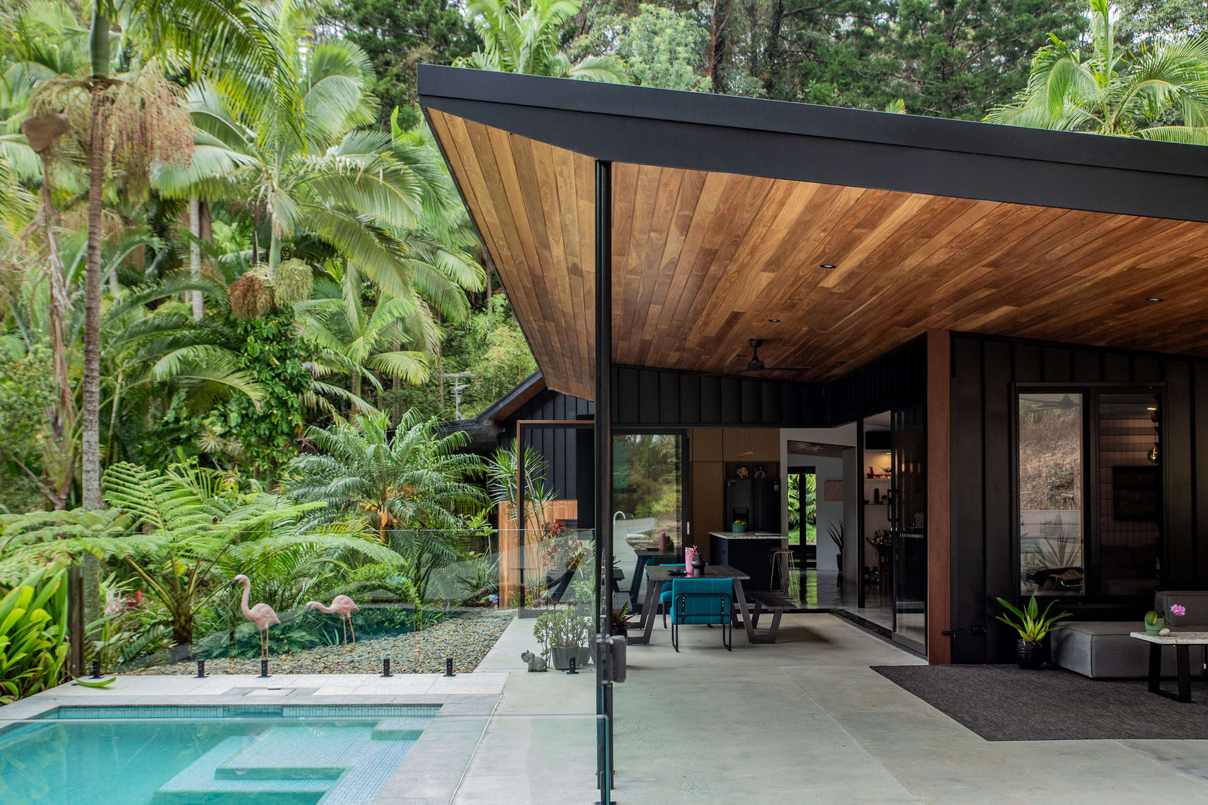 Brently Reid EcoSphereDesign 
Myocum Magic
National design award winning home in Byron Bay shire. Resort style outdoor tropical living flows to pool under timber lined pitched roof contrasted by the Enseam cladding.