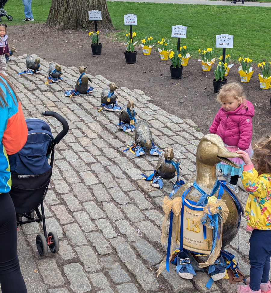 The ducks were decked out like they ran the marathon and kids were climbing all over them
