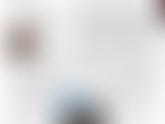 Yona Tukuser holds a "HOPE FOR PEACE" sign in St. Peter's Square at the Vatican during the Conclave