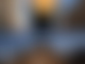 Yona Tukuser holds a "HOPE FOR PEACE" sign in St. Peter's Square at the Vatican during the Conclave