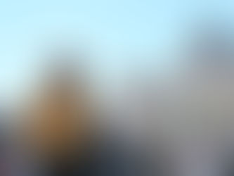 Yona Tukuser holds a "HOPE FOR PEACE" sign in St. Peter's Square at the Vatican during the Conclave