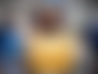 Yona Tukuser holds a "HOPE FOR PEACE" sign in St. Peter's Square at the Vatican during the Conclave