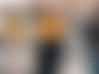 Yona Tukuser holds a "HOPE FOR PEACE" sign in St. Peter's Square at the Vatican during the Conclave