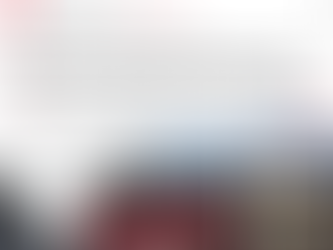 Yona Tukuser holds a "HOPE FOR PEACE" sign in St. Peter's Square at the Vatican during the Conclave