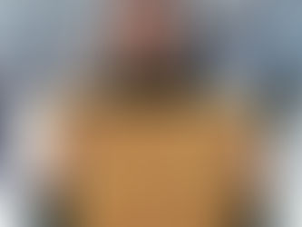 Yona Tukuser holds a "HOPE FOR PEACE" sign in St. Peter's Square at the Vatican during the Conclave