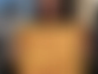 Yona Tukuser holds a "HOPE FOR PEACE" sign in St. Peter's Square at the Vatican during the Conclave