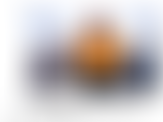 Yona Tukuser holds a "HOPE FOR PEACE" sign in St. Peter's Square at the Vatican during the Conclave