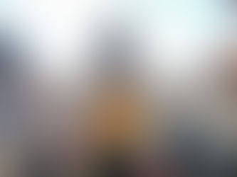 Yona Tukuser holds a "HOPE FOR PEACE" sign in St. Peter's Square at the Vatican during the Conclave