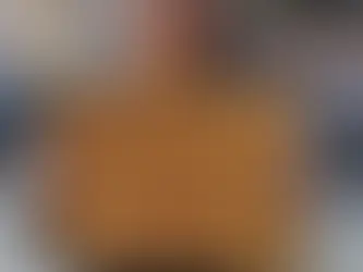 Yona Tukuser holds a "HOPE FOR PEACE" sign in St. Peter's Square at the Vatican during the Conclave