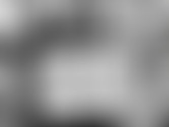 Yona Tukuser holds a "HOPE FOR PEACE" sign in St. Peter's Square at the Vatican during the Conclave