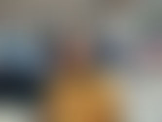 Yona Tukuser holds a "HOPE FOR PEACE" sign in St. Peter's Square at the Vatican during the Conclave