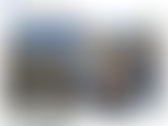 Yona Tukuser holds a "HOPE FOR PEACE" sign in St. Peter's Square at the Vatican during the Conclave