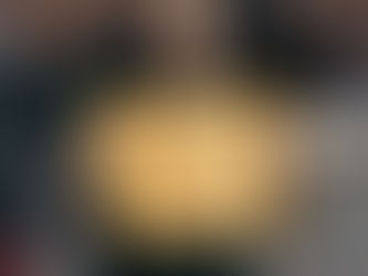 Yona Tukuser holds a "HOPE FOR PEACE" sign in St. Peter's Square at the Vatican during the Conclave