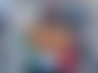 Yona Tukuser holds a "HOPE FOR PEACE" sign in St. Peter's Square at the Vatican during the Conclave