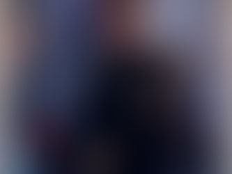 Yona Tukuser holds a "HOPE FOR PEACE" sign in St. Peter's Square at the Vatican during the Conclave