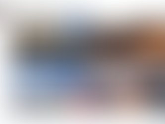 Yona Tukuser holds a "HOPE FOR PEACE" sign in St. Peter's Square at the Vatican during the Conclave