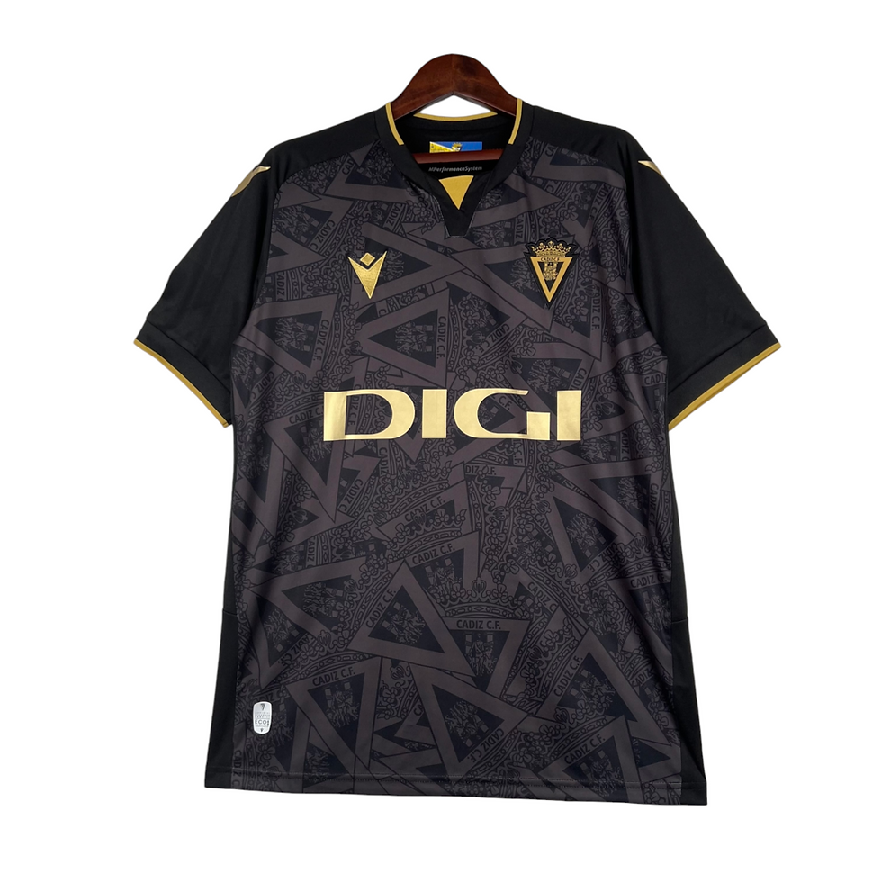 Miniatura: Camisa Cadiz III 23/24 - Torcedor Macron Masculina - Preta com detalhes em doura
