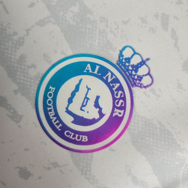 Miniatura: Camisa Al-Nassr III 23/24 - Torcedor Nike Feminina - Branca com detalhes em roxo