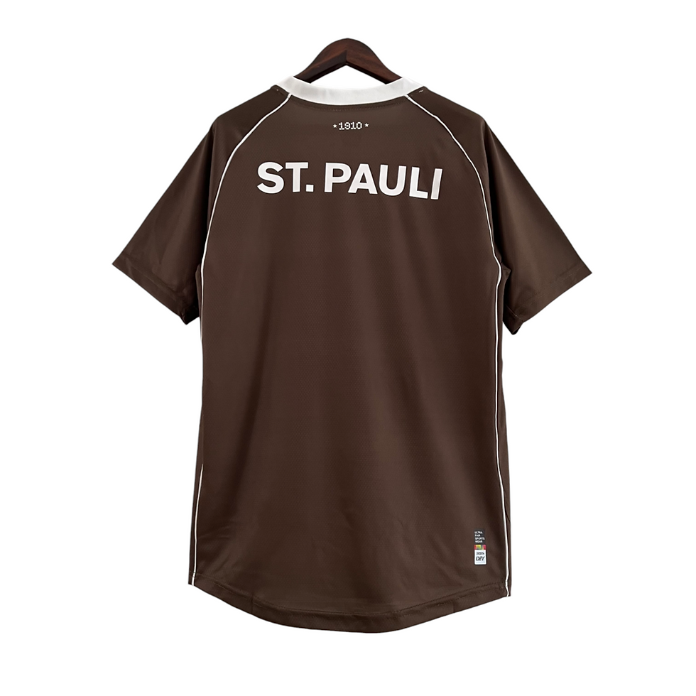 Miniatura: Camisa FC St Pauli I 23/24 - Torcedor Diiy Masculina - Marrom com detalhes em ve