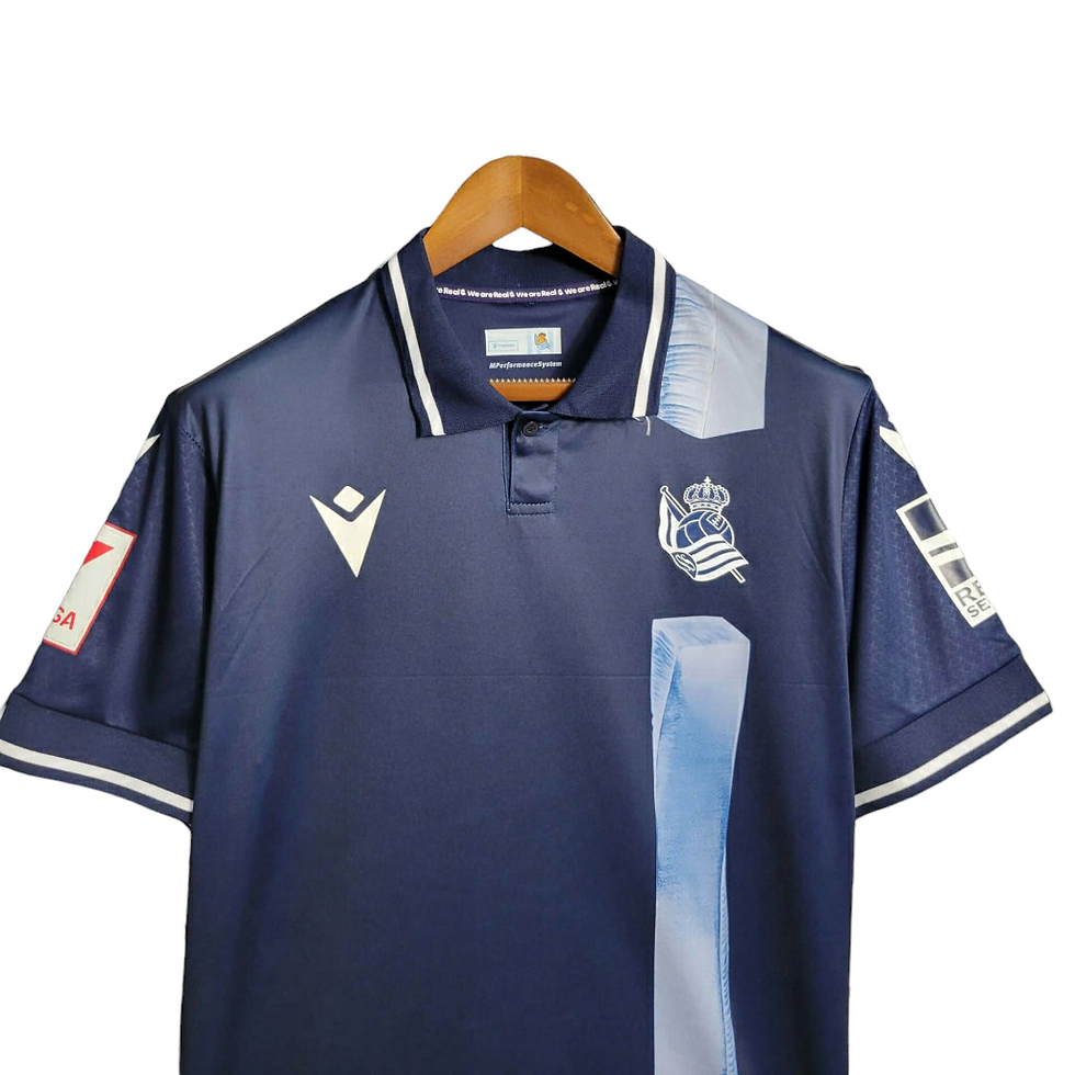 Miniatura: Camisa Real Sociedad II 23/24 - Torcedor Macron Masculina - Azul com faixa em br