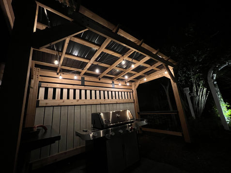 Beautiful bistro lighting over a grill with zig zag patter in Holland, Michigan - Grand Rapids, Michigan.