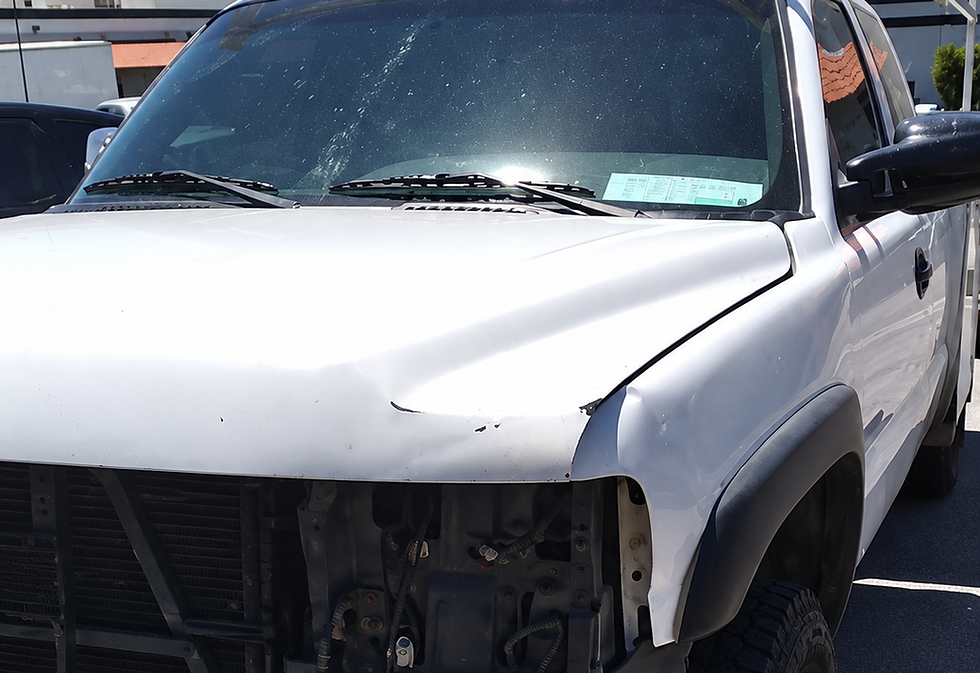 Sunlit Damaged White Pickup Truck.png