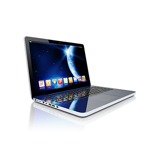 A laptop with a slight reflection coming from underneath it