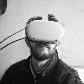 Filmmaker Matan Tal wearing an Oculous Quest 2 VR set