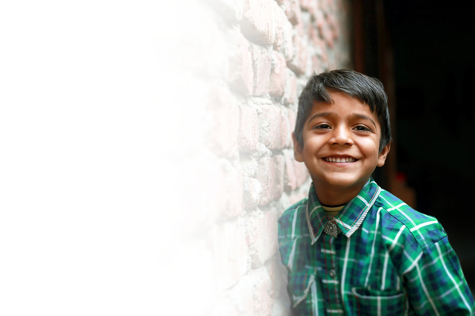 Smiling Child Outdoors_edited.jpg