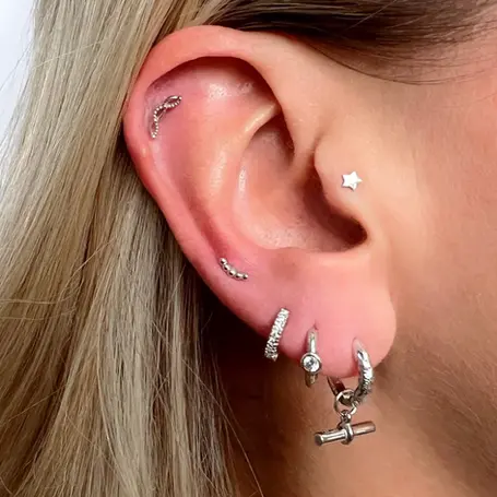a woman wearing earrings