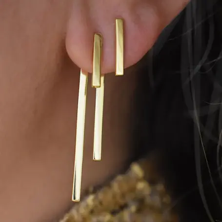 a woman wearing earrings