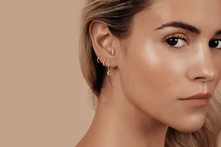 a woman wearing earrings