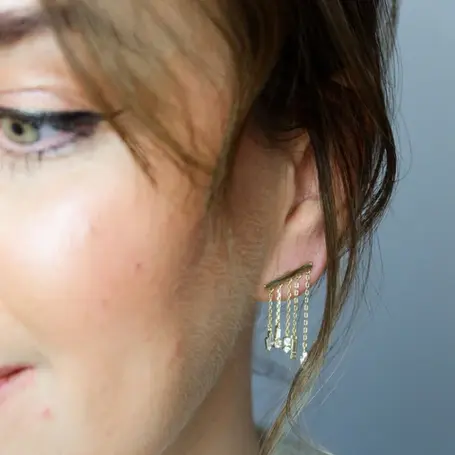 a woman wearing earrings