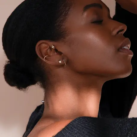 a woman wearing earrings